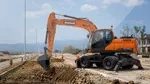 Колесный экскаватор Doosan S210W