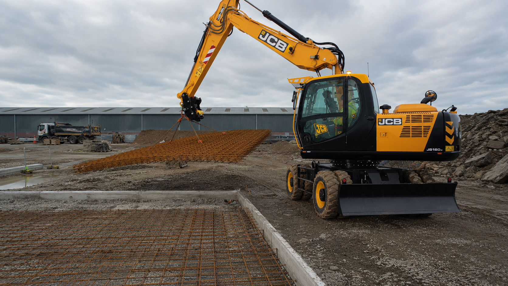 Колесный экскаватор JCB JS160